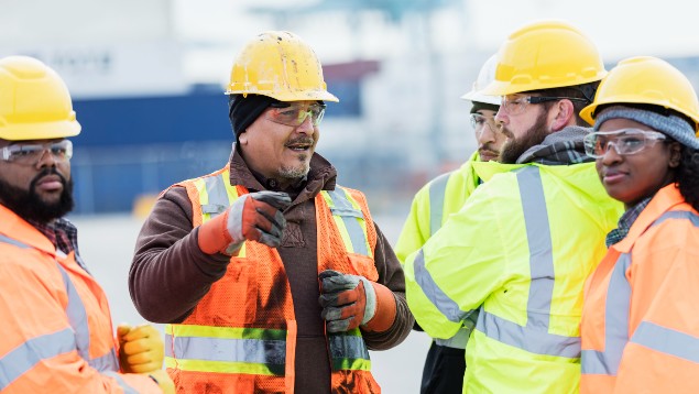 Group of workers wearing PPE on a construction site