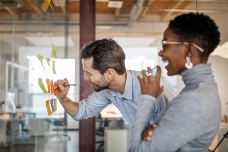Safety professionals brainstorming using sticky notes